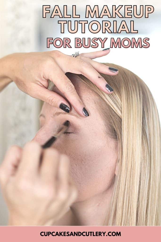 A busy mom having makeup applied.