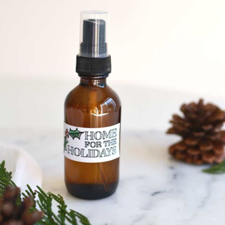A bottle of holiday room spray with custom label.