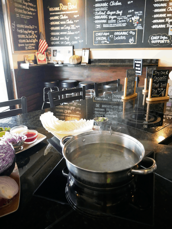 A hot pot with water at True Seasons Organic Kitchen in Anaheim.