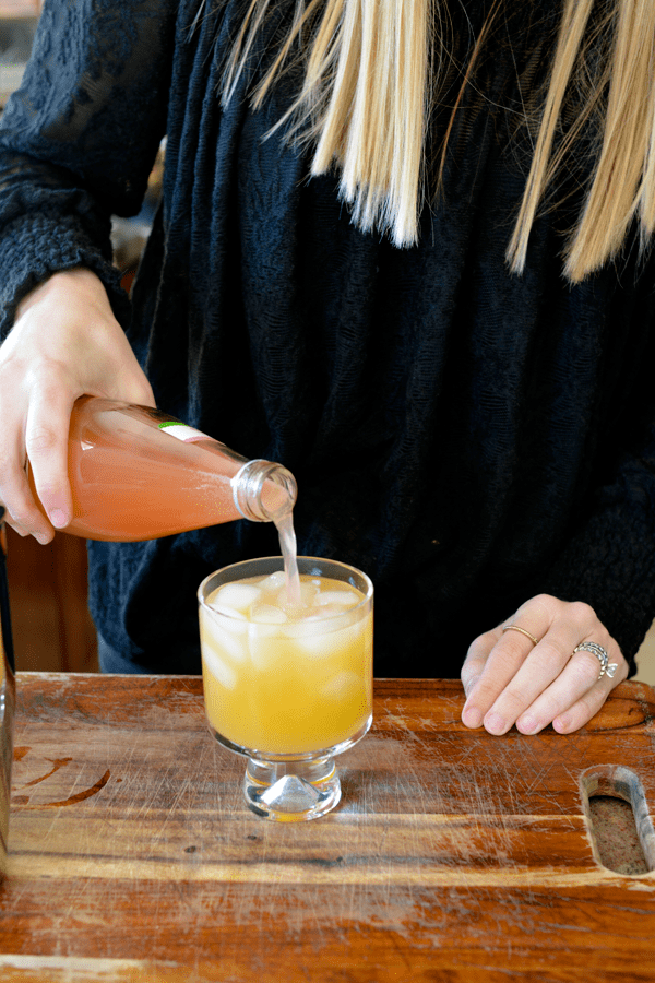 Grapefruit and peach tequila cocktail recipe topped with grapefruit soda.