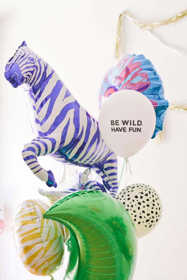 zebra and other mylar balloons in a balloon boquet for graduates