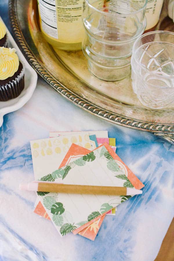 Patterned note cards on a party table to record graduation wishes or bucket list idea.