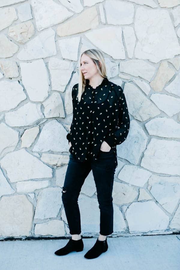 Blond girl in embroidered shirt from Cabi Clothing