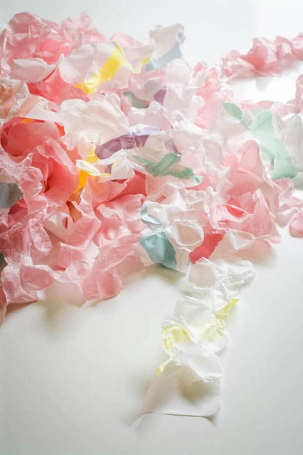 Plastic tablecloth party streamers that have been ruffled.