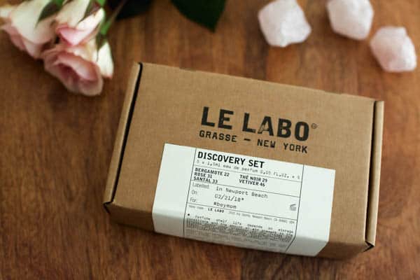 Box holding a Le Labo discovery set on a table. 
