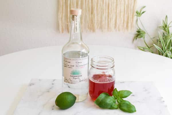 Ingredients for a strawberry basil margarita.