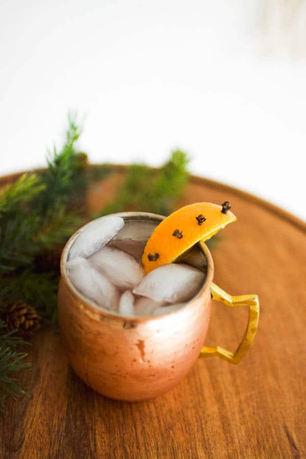 Top down image of a winter Moscow mule in a copper mug.