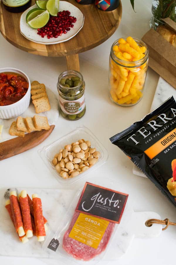 A variety of snacks spread out on a table. 