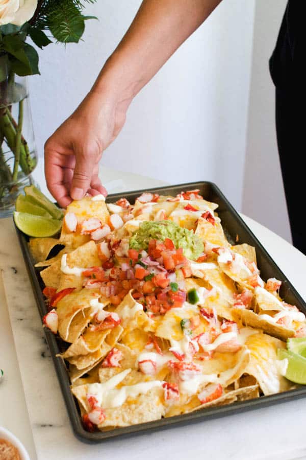 Lobster nachos are the perfect party food for a low key fancy New Year's Eve night in.