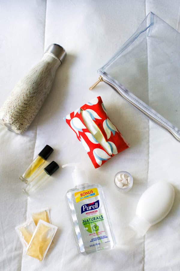 Products on a bed for a wellness kit. 