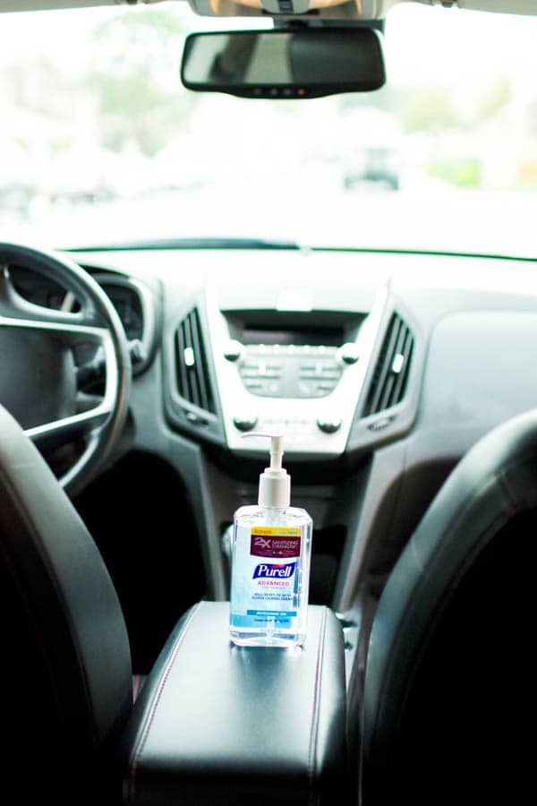 A bottle of hand sanitizer in the car. 