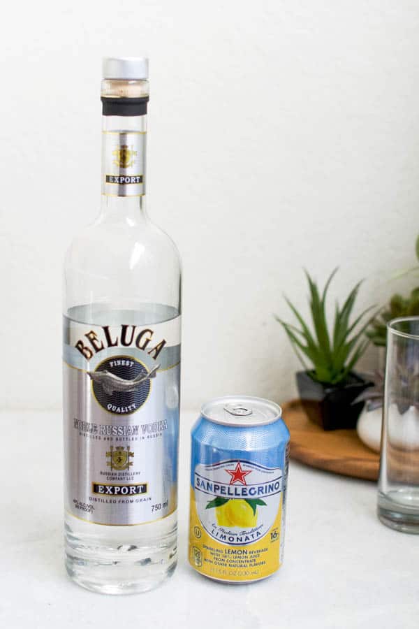 Ingredients for an easy lemon san pellegrino drink with vodka.