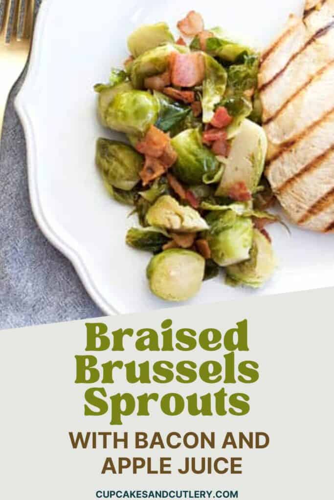 Text: Braised Brussels Sprouts with bacon and apple juice with a portion of the side dish on a white place next to chicken.