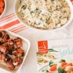 Food on a table with a Schwan's catalog.