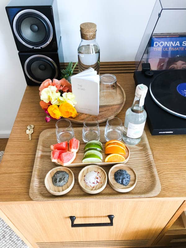 Tequila tasting amenity set up on a tray in a hotel room in Laguna Beach.