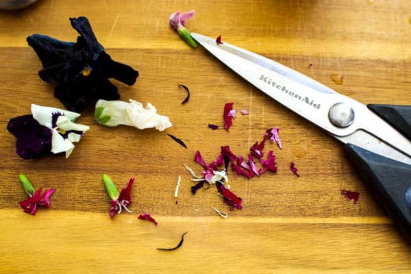 Making drink confetti with edible flowers.