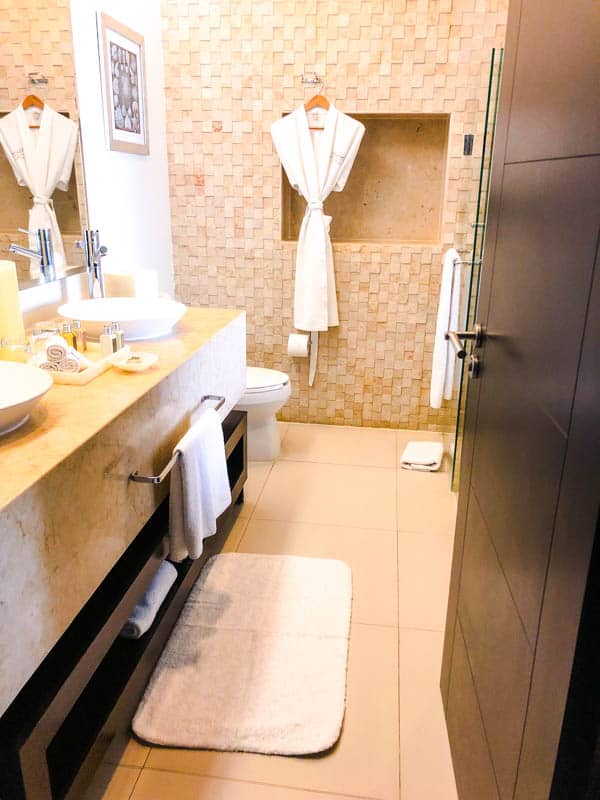 A view of the primary bathroom at the Marival Distinct hotel.