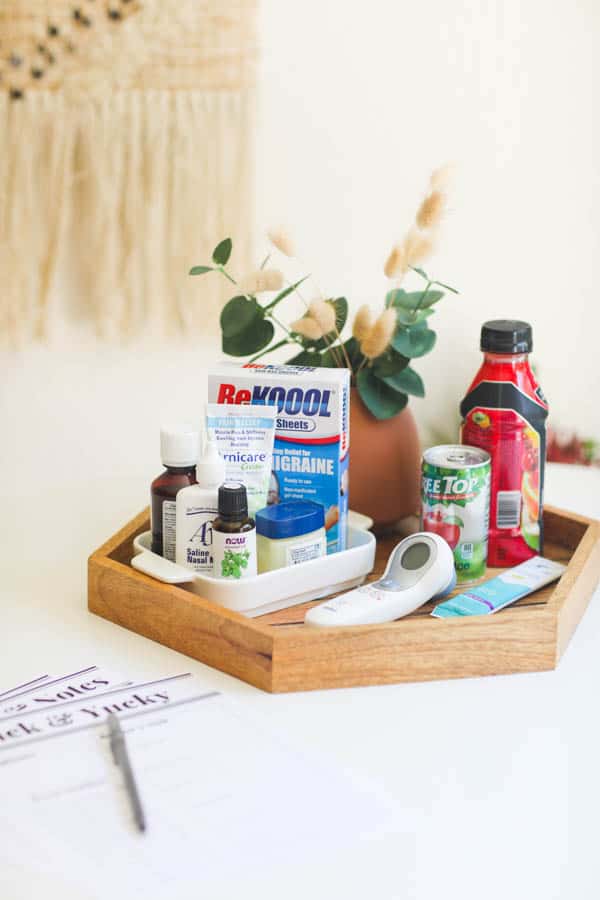 sick day essentials on a tray on a table