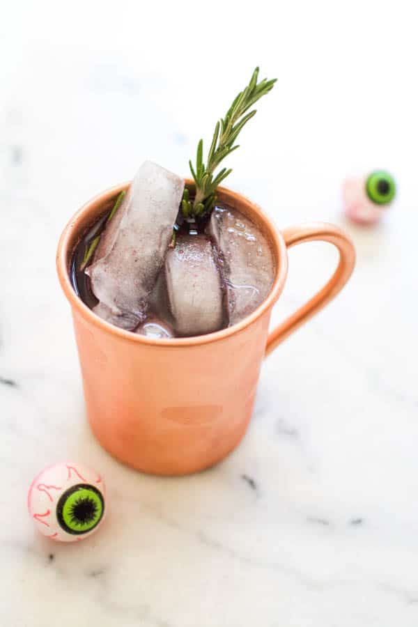 Cute blackberry Halloween Moscow Mule with Captain Morgan spiced rum.