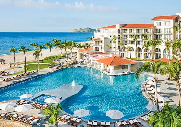 Pool area of Dreams Los Cabos Suites Golf Resort & Spa