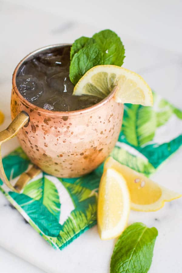 Close up view of the top of a lemonade Moscow Mule in a copper mug.