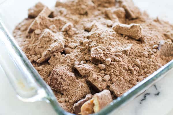 Chocolate cake mix poured over candy bar pieces. 