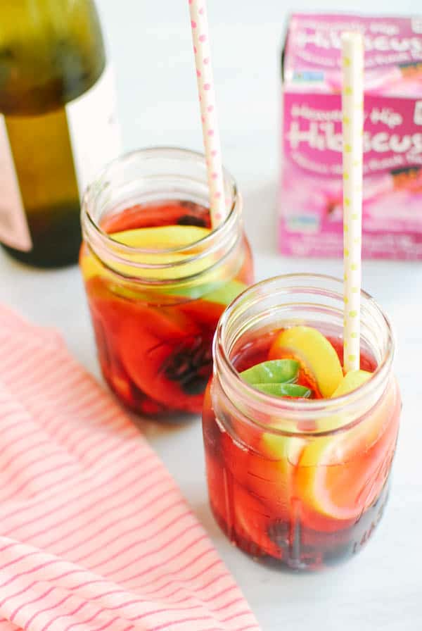Hibiscus Sangria in jars with straws.