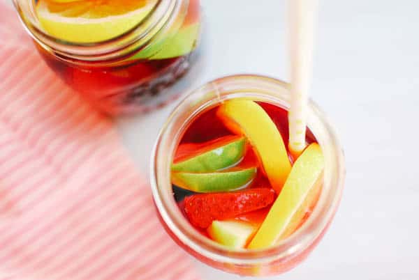 View of sangria with fresh fruit from the top down.