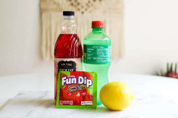 Ingredients for making a kid's drink with Fun Dip.