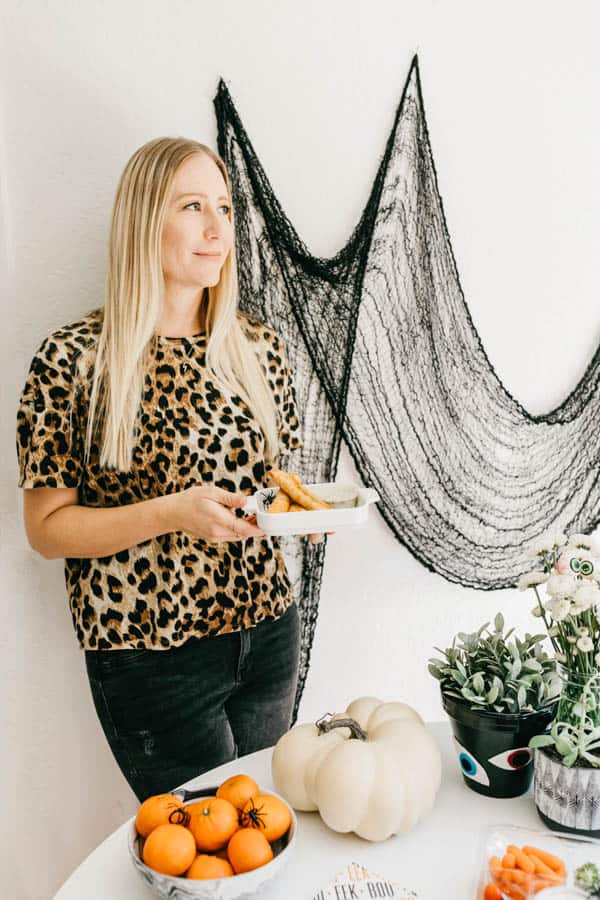 Woman holding finger snacks for parties and Halloween.