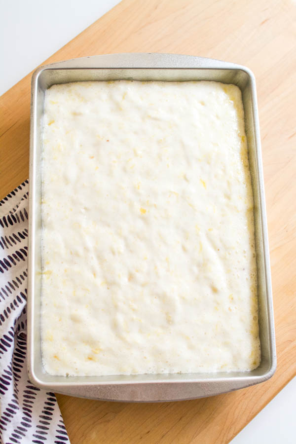 Weight watchers pineapple cake in a pan on a kitchen counter.