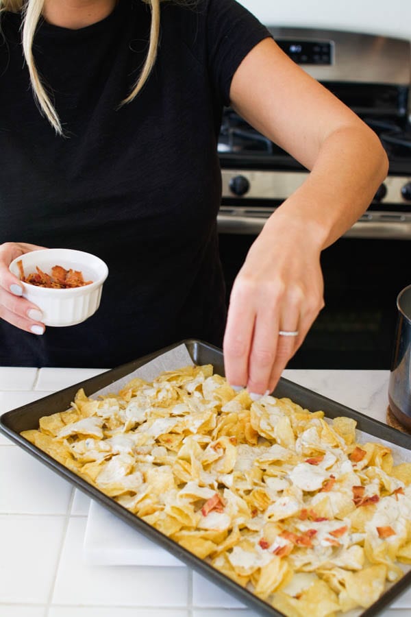 Add bacon to blue cheese potato chip nachos.