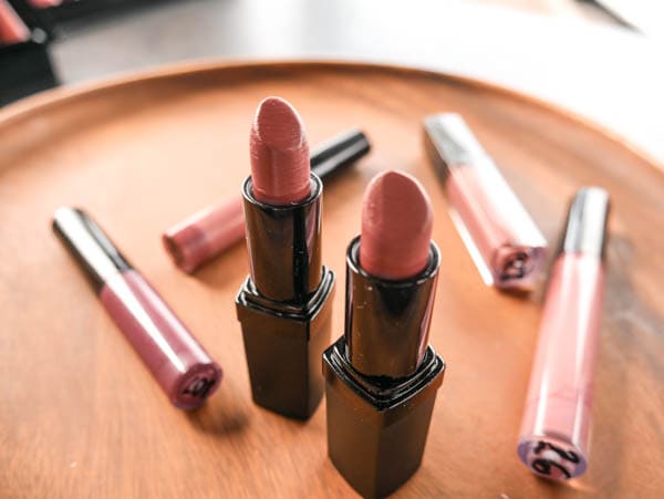 several lipsticks on a tray