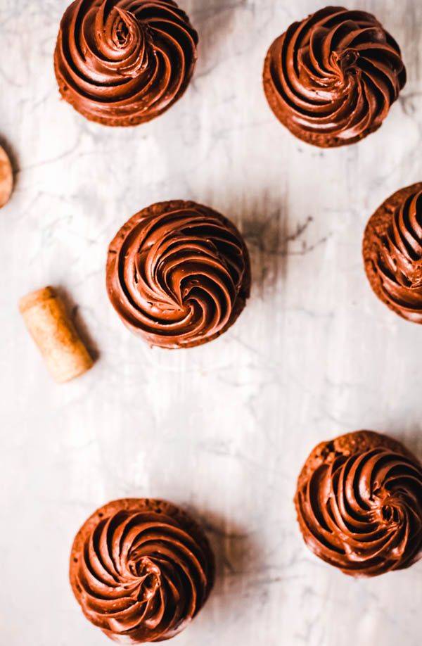 Top down picture of frosted chocolate cupcakes.