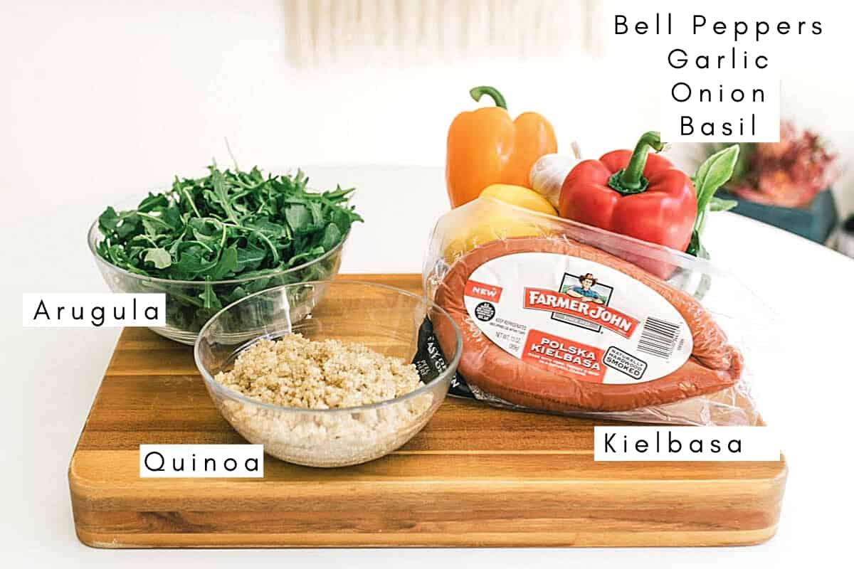 Labeled ingredients to make a Sausage and Quinoa bowl.