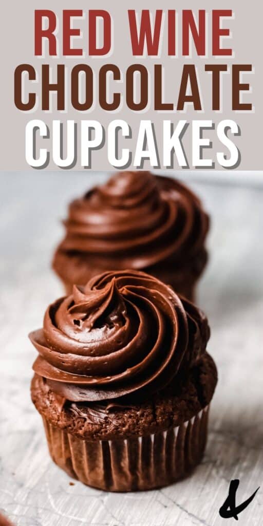 Close up of a chocolate cupcake topped with a swirl of chocolate frosting.
