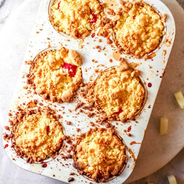 A tin holding dump cake cupcakes.