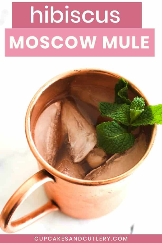 Hibiscus Mule in a copper mug with a text overlay.