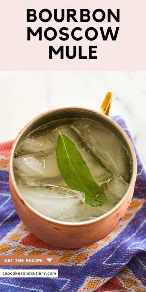 Overhead of a Bourbon Moscow Mule in a copper mug with a piece of fresh sage.