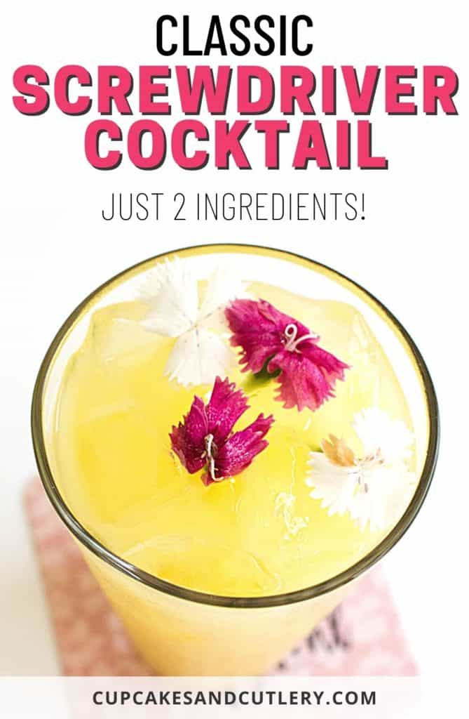 A Screwdriver cocktail in a glass with pink and white edible flowers and text that says "Classic Screwdriver Cocktail".