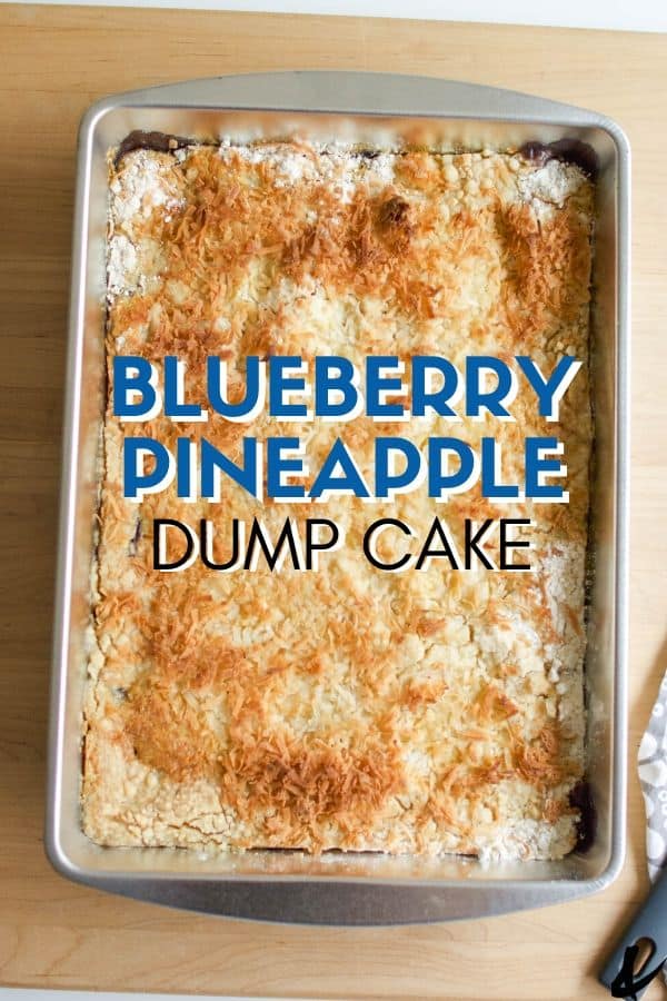 baking dish of a blueberry pineapple dump cake recipe on a wooden cutting board with a text overlay.