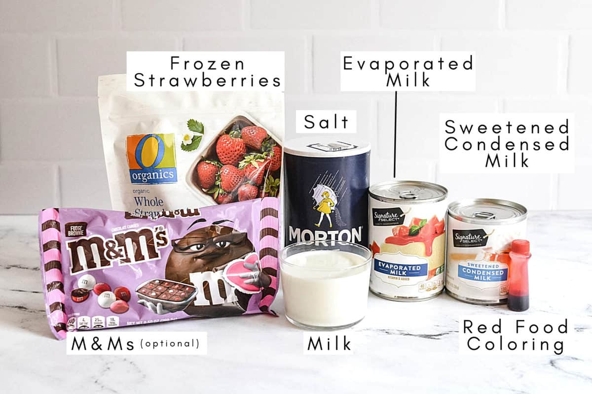 Labeled ingredients to make a homemade strawberry ice cream.