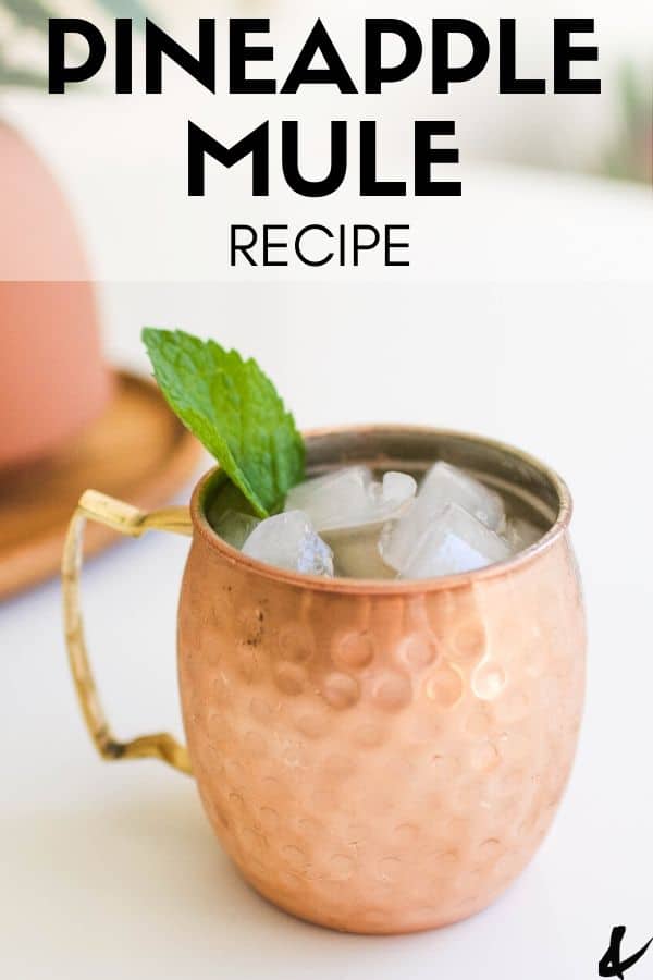 Pineapple Mule in a copper mug with text overlay.