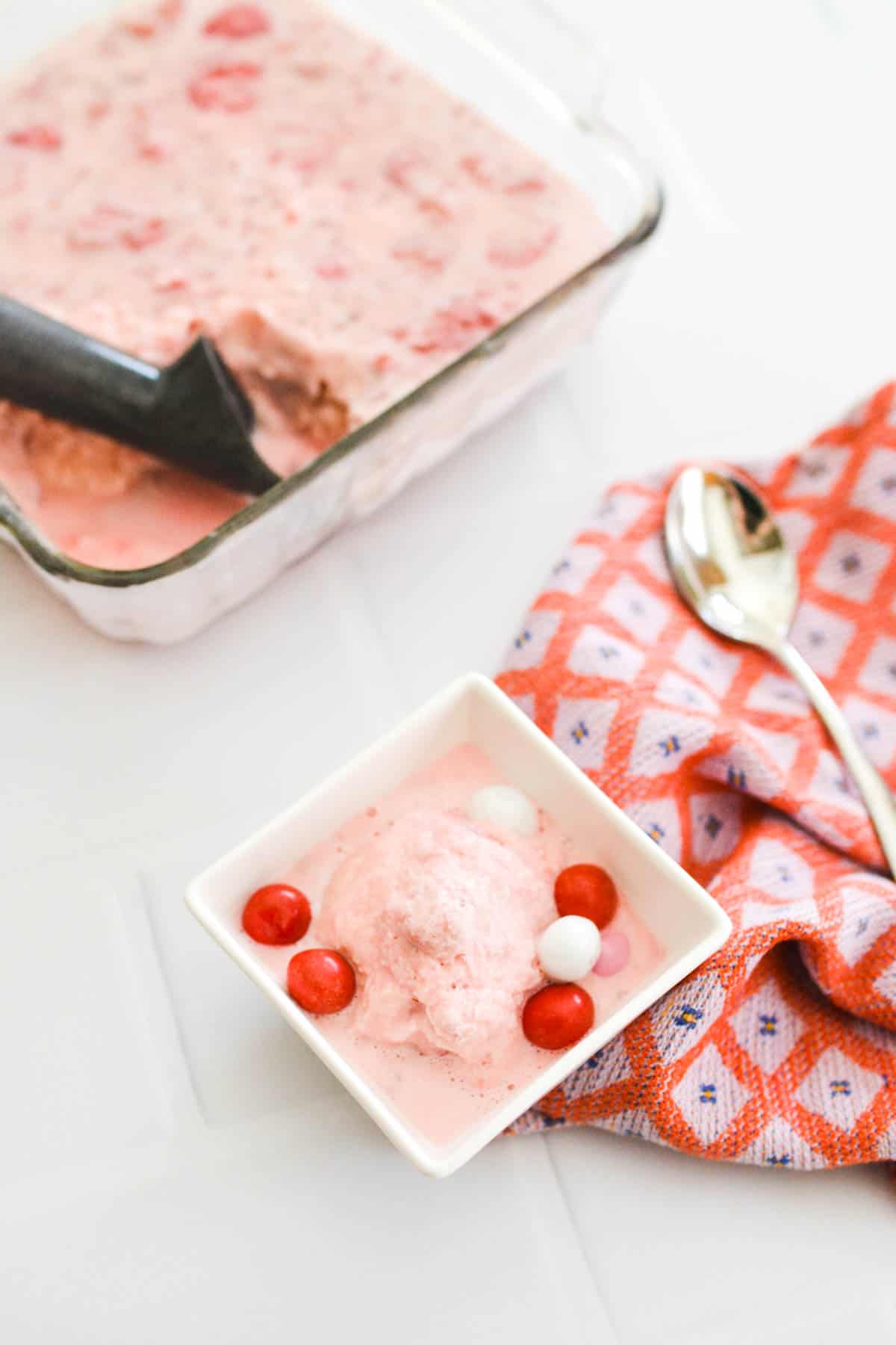 Close up of a small bowl holding an easy strawberry ice cream.