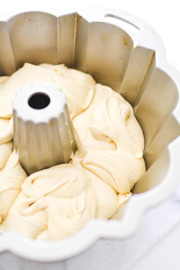 batter with cake mix and soda in a bundt pan