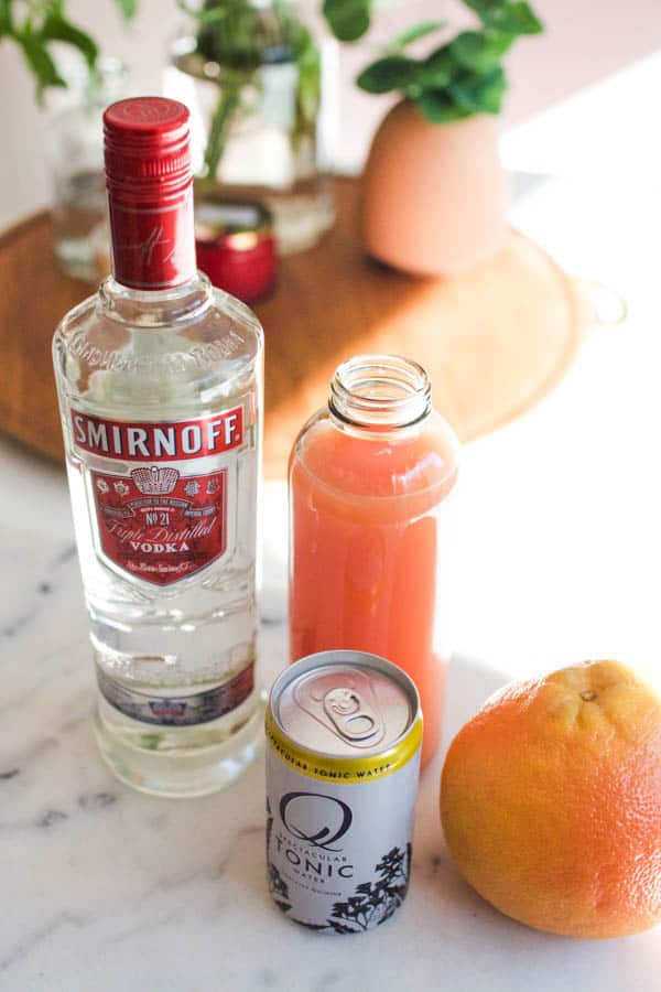 Ingredients for Grapefruit Vodka Tonic on a table
