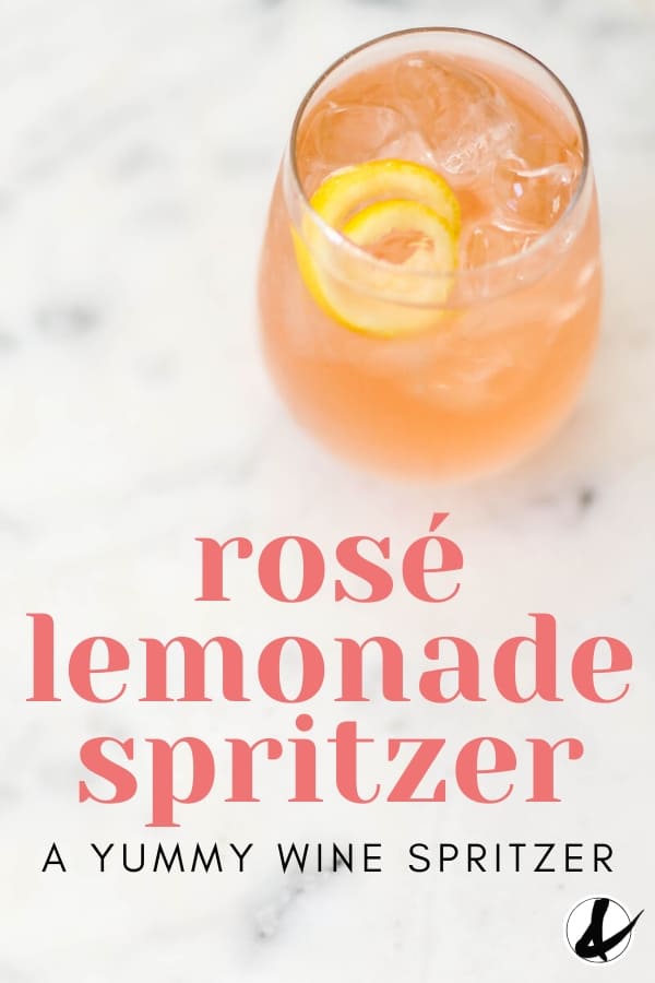 Rose Lemonade Spritzer in glass with a lemon garnish with text overlay. 