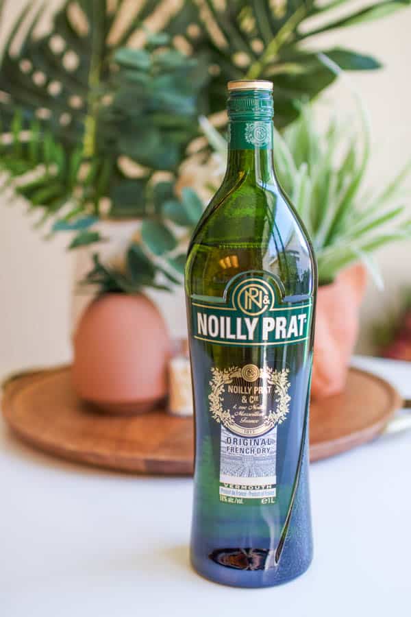Noilly Prat bottle on table.