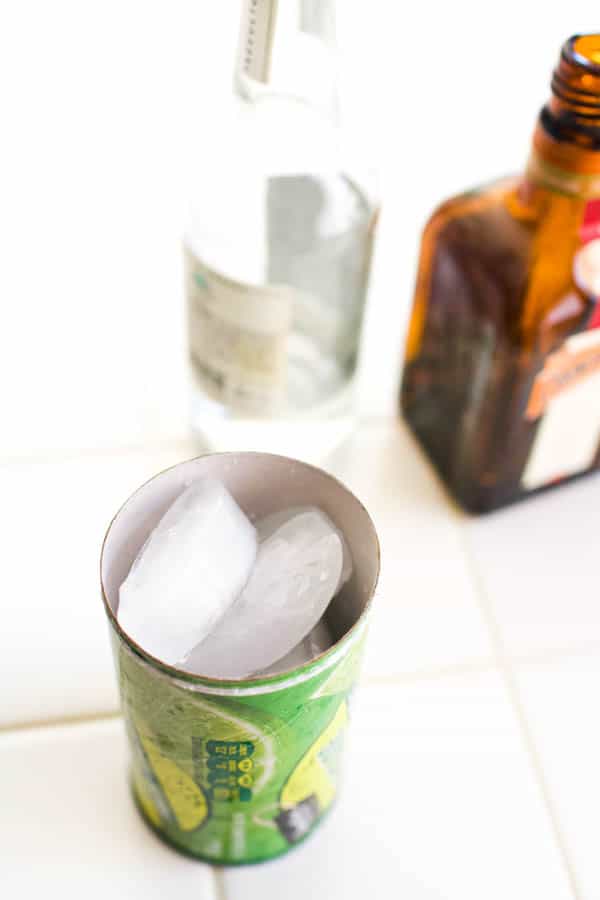 Ice in an empty can of limeade to make a margarita.