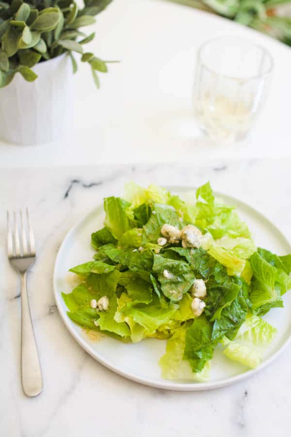 Romaine salad dressed with Blue Cheese Vinaigrette dressing.